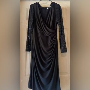 Gentley used Black party dress with sequin on the sleeves.